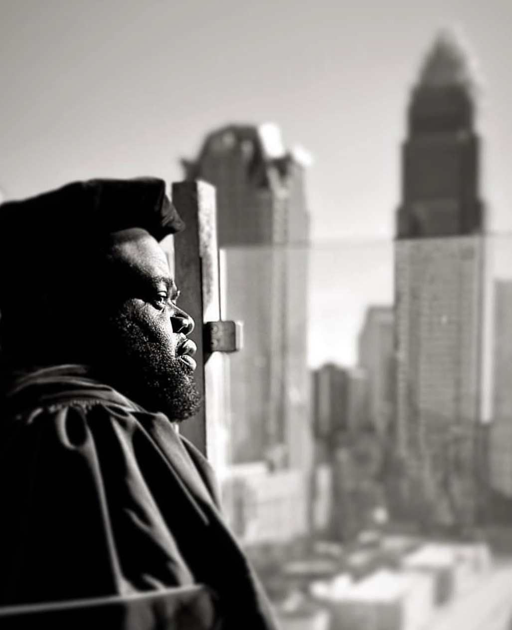 Dr. Kerry L. Shipman in doctoral regalia overlooking the Charlotte skyline